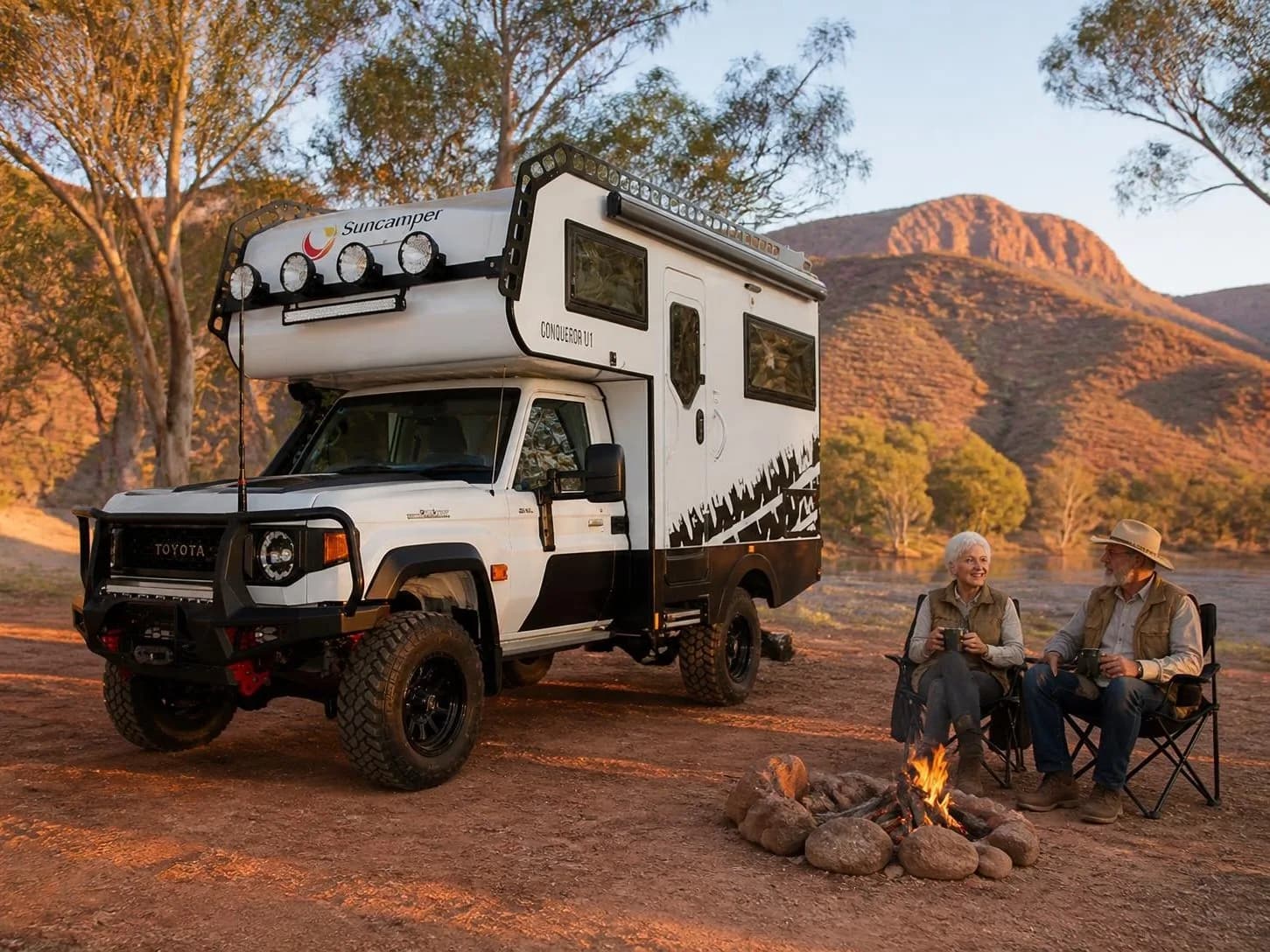 Custom 4x4 motorhome at an outback camp
